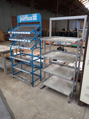 many shelves that are sitting in a warehouse