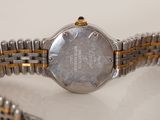 an image of a close up of a wrist watch on a table