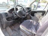 a picture of a car with a bag in the passenger seat