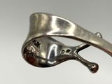 silver plated cuff bracelet with a bird on it ' s side