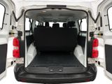 the back of a white van with its cargo doors open