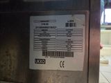 a label on the side of a machine that has a barcode on it
