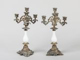 pair of antique brass candelabs with white glass lamps