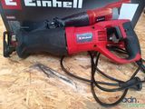 an image of a corded electric tool sitting on top of a box