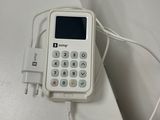 a cell phone that is connected to a charger