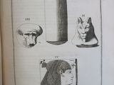 an old book with a drawing of a man ' s head and a woman ' s head and a man ' s head and a woman ' s head