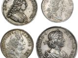 four roman silver coins, one of which has a bust and the other of which is a bust