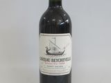 a bottle of wine that is sitting on a table