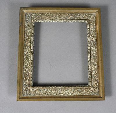 a gold picture frame with a white background