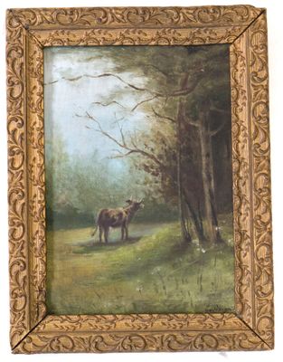 PERIGNON. Vache près d'une lisière de forêt.