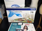two boxes of brother quilting kits on a table