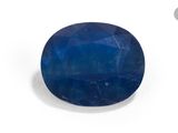 a close up of a blue sapphire stone on a white background