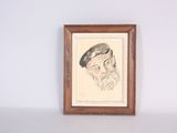 an old picture of a man with a beard and a hat is hanging on a wall