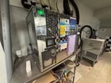 a machine that is sitting in a kitchen next to a counter