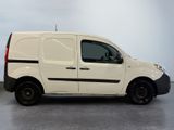 a picture of a white van parked in a garage