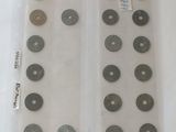 a lot of coins in a bag on a table