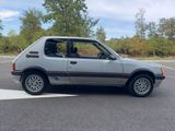 a small car that is parked in a parking lot