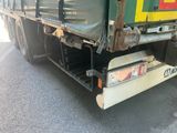 a truck that is parked on the side of the road
