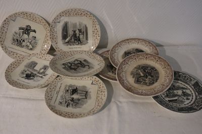a lot of plates that are sitting on a table