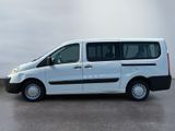 a picture of a white van parked in a parking lot
