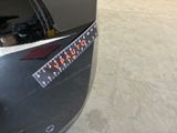 a close up of a car with a sticker on it