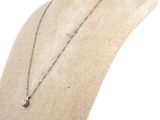 a close up of a mannequin torso with a necklace on it