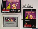 two boxes of nintendo games on a white surface