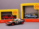 two toy cars that are sitting in a box