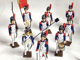 seven figurines of soldiers dressed in blue and red uniforms