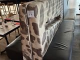 a couch that is sitting in the middle of a room