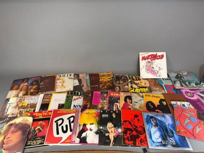 a lot of records on a table with a lot of them