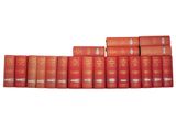 a row of red books sitting on top of each other