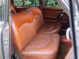 a brown leather seat in the back of a car