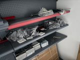 a shelf with many different items on it in a room