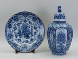 pair of blue and white vases and a blue and white plate