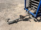 a blue cart that has some sort of equipment on it