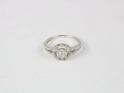 Bague marguerite moderne, ajourée, sertie de diamants de tai…
