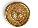 an image of a close up of a gold coin with a globe on it