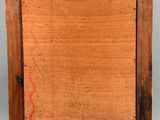 a painting of a wooden frame with red writing on it