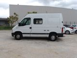 a white van that is parked in a parking lot