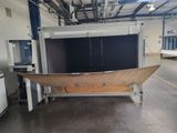 an image of a large boat in a warehouse