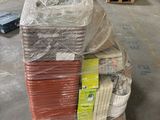 a large stack of boxes on a pallet in a warehouse
