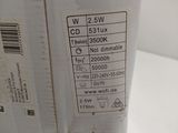 a white box with a label on it sitting on a table