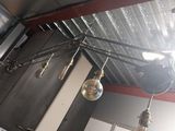 a light that is hanging from the ceiling in the room