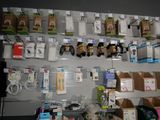 many electronic devices on the wall in the store