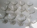 a lot of empty wine glasses sitting on a table