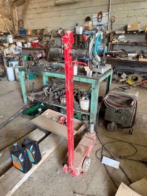 an image of a garage with a lot of tools on it