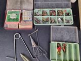 many different types of fishing lures in a box