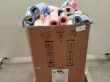 a cardboard box full of assorted items sitting on a pallet