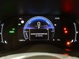 a close up of a car dashboard with a speedometer